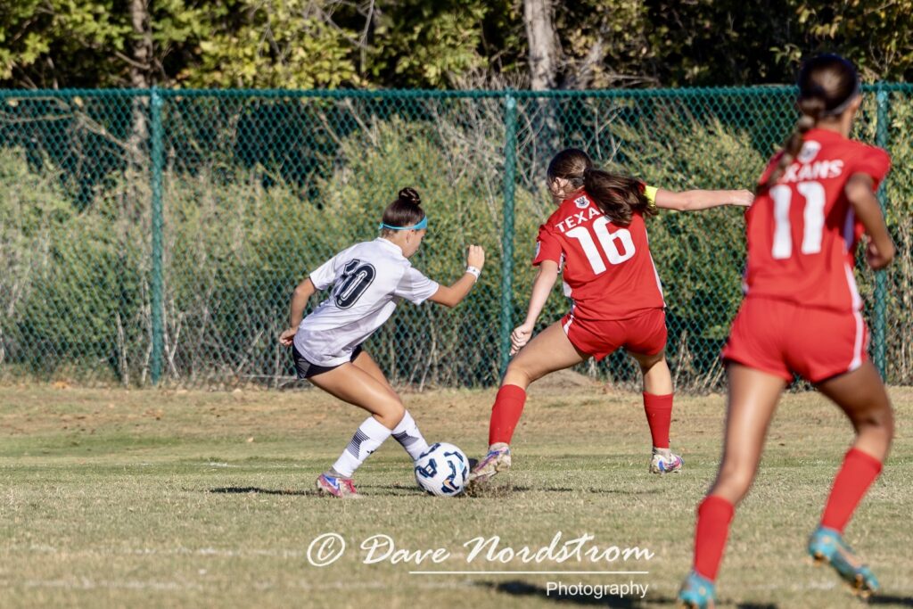 Olivia Leddy playing soccer